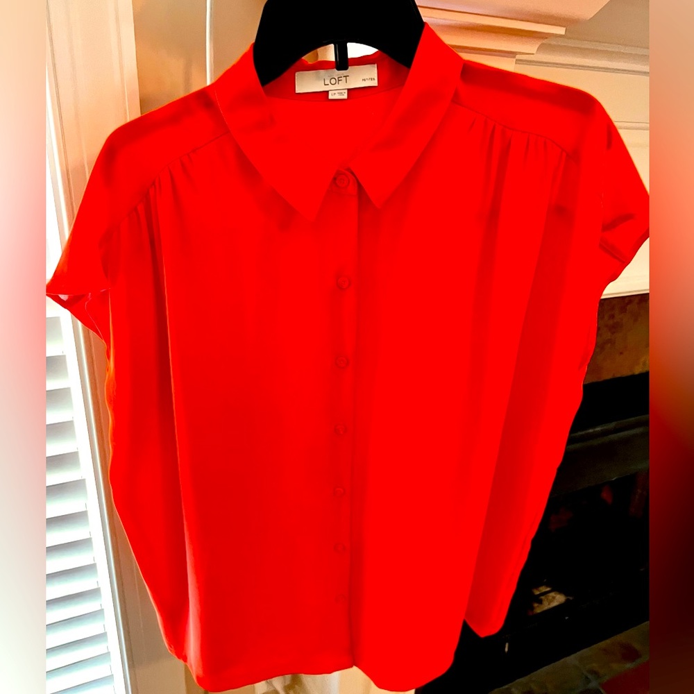 Orange button down blouse. Like new.
